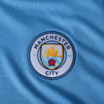 MANCHESTERCITYHOME20242025BLUE_2_0cf9fc95-3768-4934-8e4f-ce6cd2bcc0ae.png