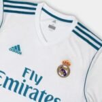 CamisaRealMadridRetroI17_18Adidas-Branco_5a26753c-d0f1-4671-a9bc-3a9162f97ed6.jpg